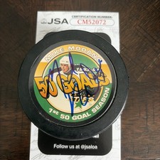 Mike Modano Signed 1st 50 Goal Season Hockey Puck JSA