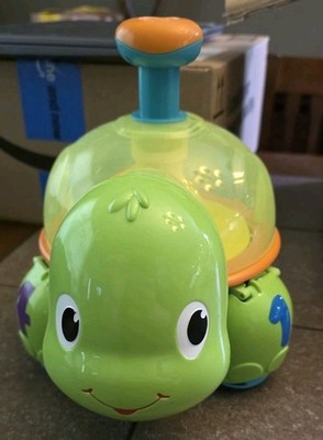 Bright Starts Press And Drop Ball Play Toy: Educational Focus Fine Skills