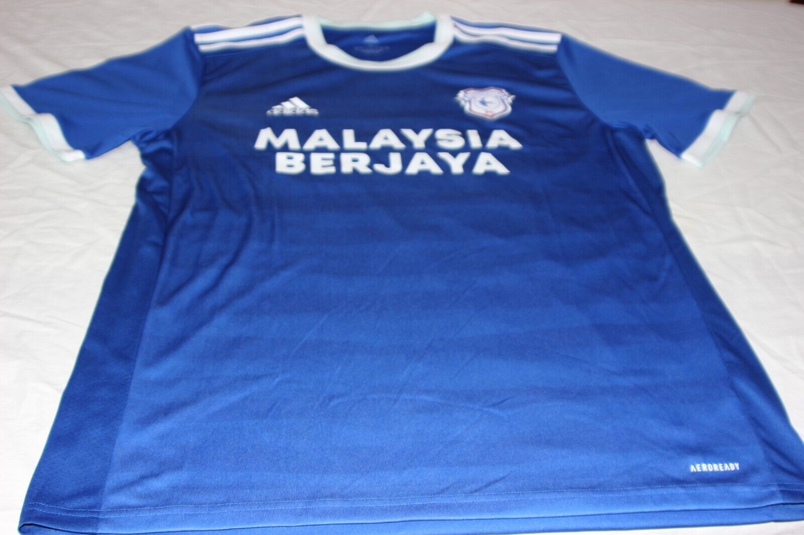 New Balance Poppy Cardiff City FC Malaysia Berjaya Shirt t-shirt