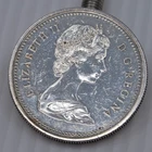 * 1973  SILVER CANADIAN DOLLAR MOUNTED POLICE MOUNTIE CANADA