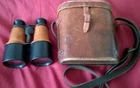 WW1 FRENCH MILITARY BINOCULARS WITH ORIGINAL LEATHER CASE.