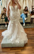 Maggie Sottero wedding dress size 14 new, never worn or altered.