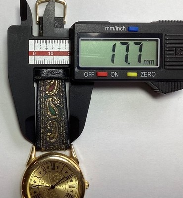 Triumph Vintage Gold-Tone Women’s Watch with Original Patterned Strap EUC Triumph Womens Vintage Watch Gold Tone Paisley Stitched Band  main image 2
