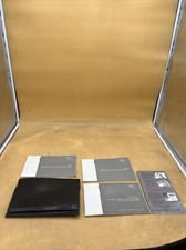 2003 NISSAN WARRANTY AND MAINTENANCE SUPPLEMENT MANUALS WITH STORAGE CAS.