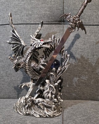 Dragon Statue( Blue Sphere Red Eyes With Sword) 9 X 6 1/2