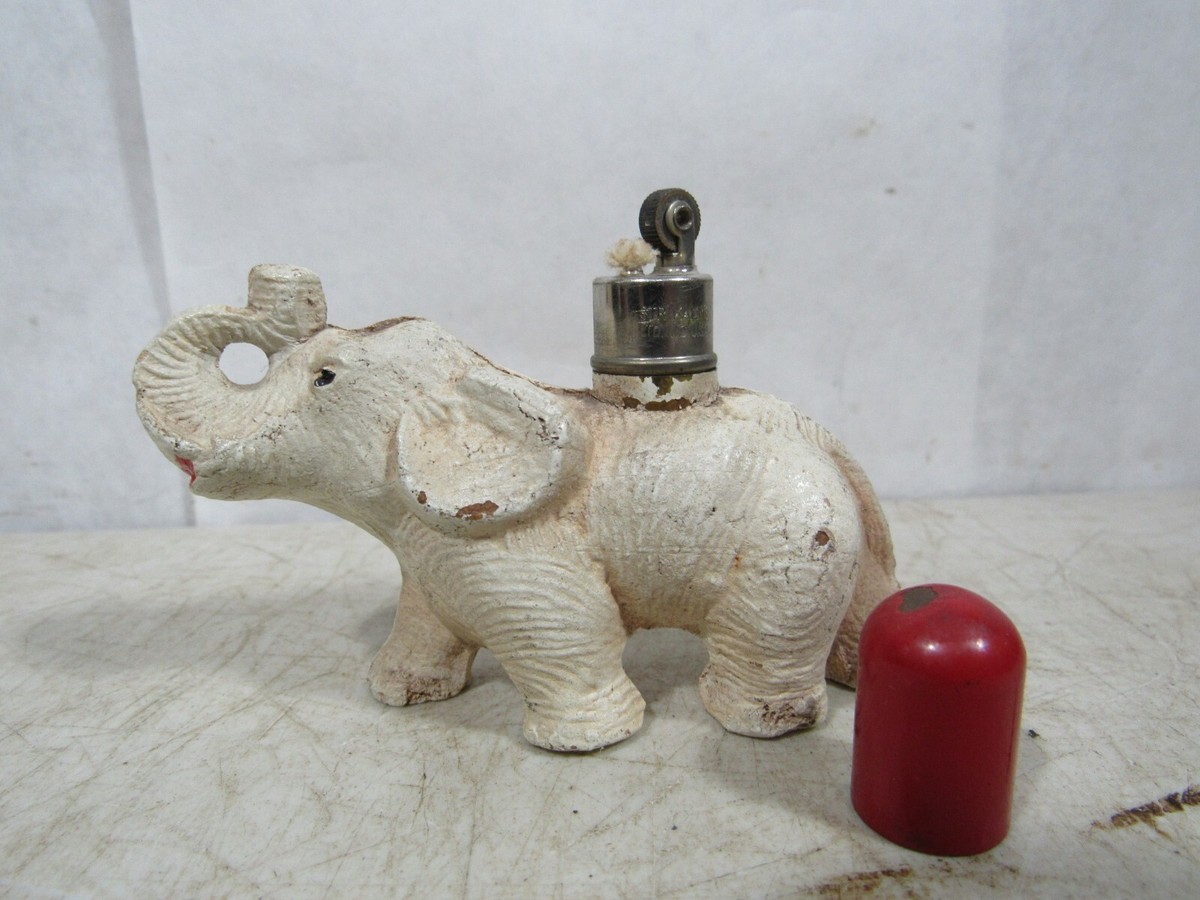 elephant cigarette lighter Vintage Rosenfeld for Florenza Delicate swirls and floral designs are fused into this lighter to create an elephant design India Elephant Lighter Restoration
