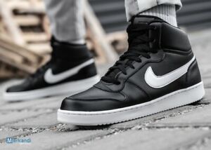 black white and grey nike high tops