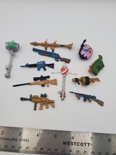 Lot of Fortnite Action Figures Accessories Weapons Rocket Launcher TAT Axe Guns
