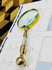 Vintage magnifying glass with solid brass with Mother of Pearl handle 4 inch