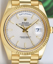 ROLEX 18kt Gold Day Date 40 President Silver Index Motif Model 228238 3