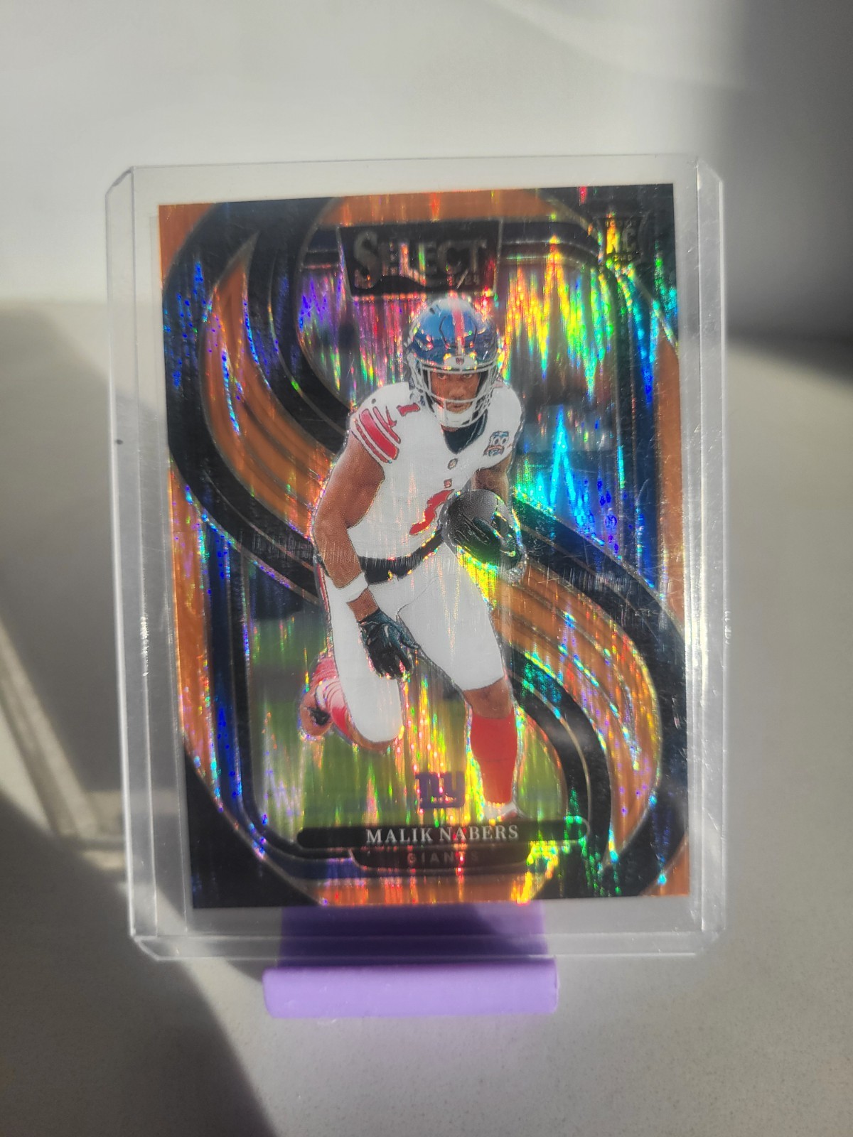 2024 Panini Select - Premier Level Malik Nabers Orange Shock Prizm /399