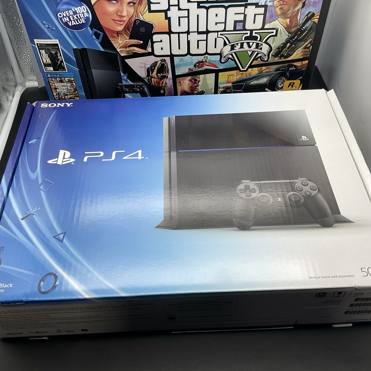 Sony PlayStation 4 500GB Game Console with GTA V and The Last of