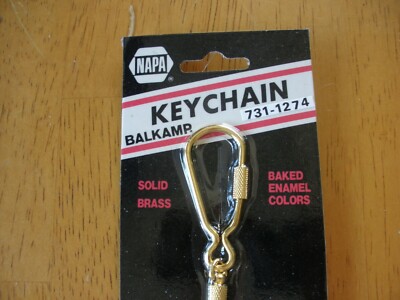 ZX Kawasaki Nissan keychain solid brass early 1980s NOS baked
