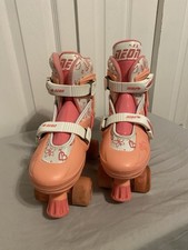 Neon Adjustable Roller Skates. Fits Women Size 3-6.