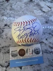 Sammy Sosa autographed 609 Home Runs baseball with certificate of authenticity