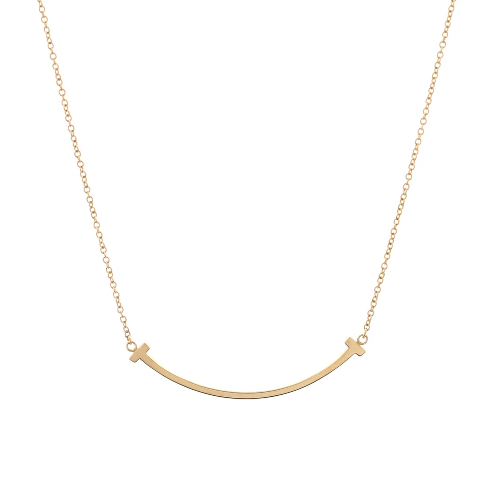 Collar colgante Tiffany & Co. T Smile pequeño de oro amarillo de 18 quilates