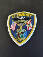 VINTAGE 4 1/4 INCH CLERMONT FLORIDA POLICE PATCH FL OBSOLETE WIDE WHITE BOARDER