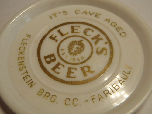 Vintage Fleck's Beer PLASTIC COASTER Fleckstien Faribault Minnesota Brewery