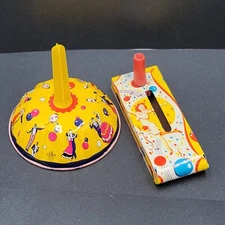 Vintage Litho US Metal Toys Noisemakers Lot of 2 New Years Dancers Made in USA