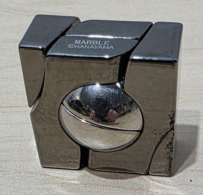 Hanayama Cast Puzzle Marble Difficulty Level 5 V Brain Teaser 3D Logic Challenge