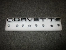 74/75 corvette CORVETTE rear bumper emblem set with nuts NEW!! 