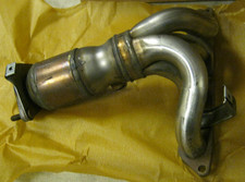 MG MGF, MG TF. EXHAUST MANIFOLD AND CATALYST. NOS ROVER PART. # WCJ106490