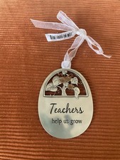   Teachers help us grow  Metal Ornament