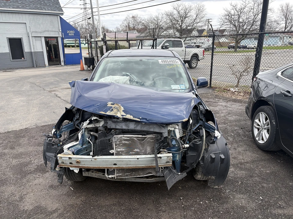 Used Left Tail Light Assembly fits: 2012 Nissan Versa quarter panel mounted Sdn - Image 3 of 4