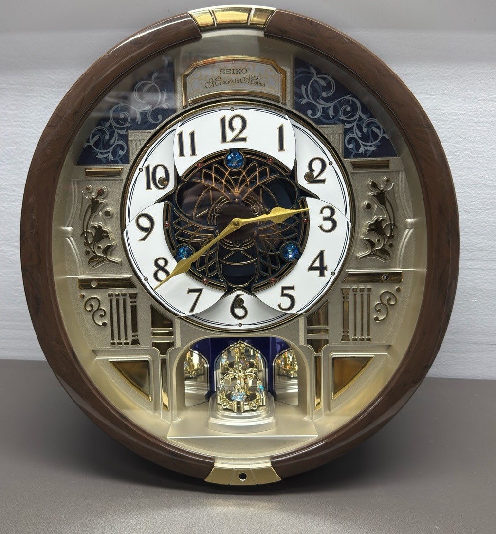 Seiko Melodie&rsquo;s In Motion QXM390BRH Musical Clock 36 Songs