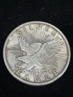 Sunshine Minting 1 Troy Ounce .999 Fine Silver Eagle Round.