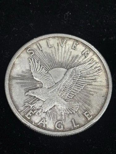 Sunshine Minting 1 Troy Ounce .999 Fine Silver Eagle Round.