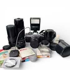 Canon AE-1 Camera Kit 5 FD Lenses Flash 188A Teleconverter Manuals Filters
