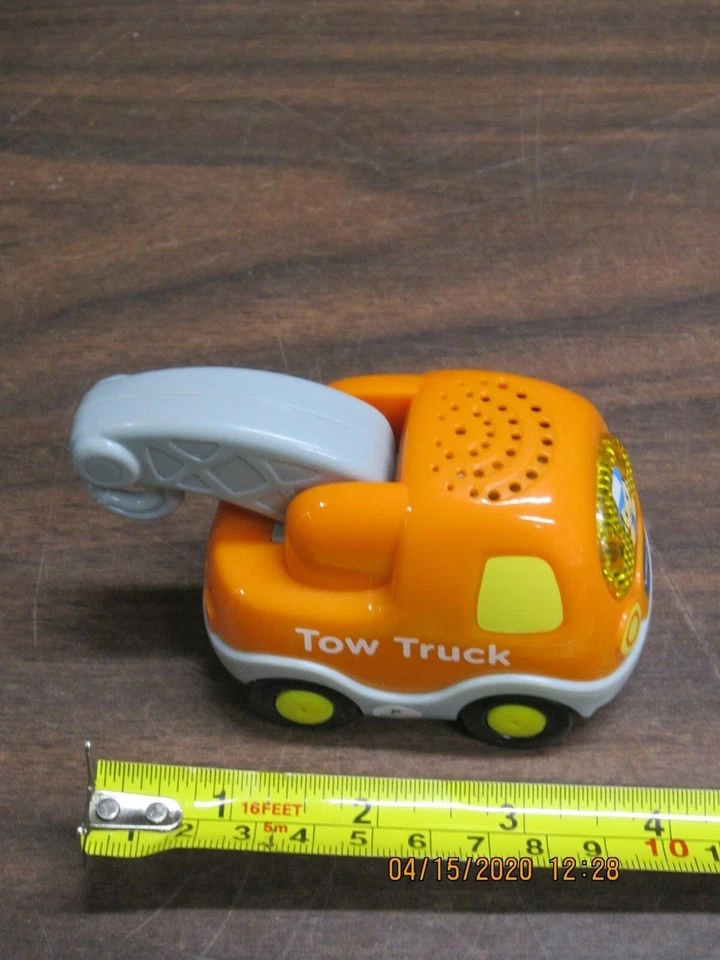 Remolque V-tech naranja ruedas negras juguete divertido rollos luces sonidos gancho vehículo Foto 2 de 4