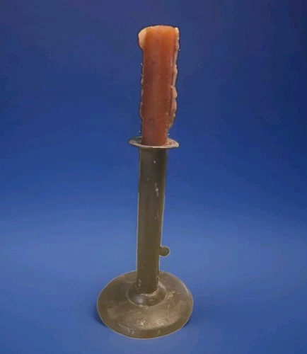 ANTIQUE PRIMITIVE BLACK PUSH UP HOG SCRAPER CANDLE HOLDER  7" TALL X 3.75." DIAM