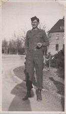 WW2 Photo of US Soldier Standing on Village Road