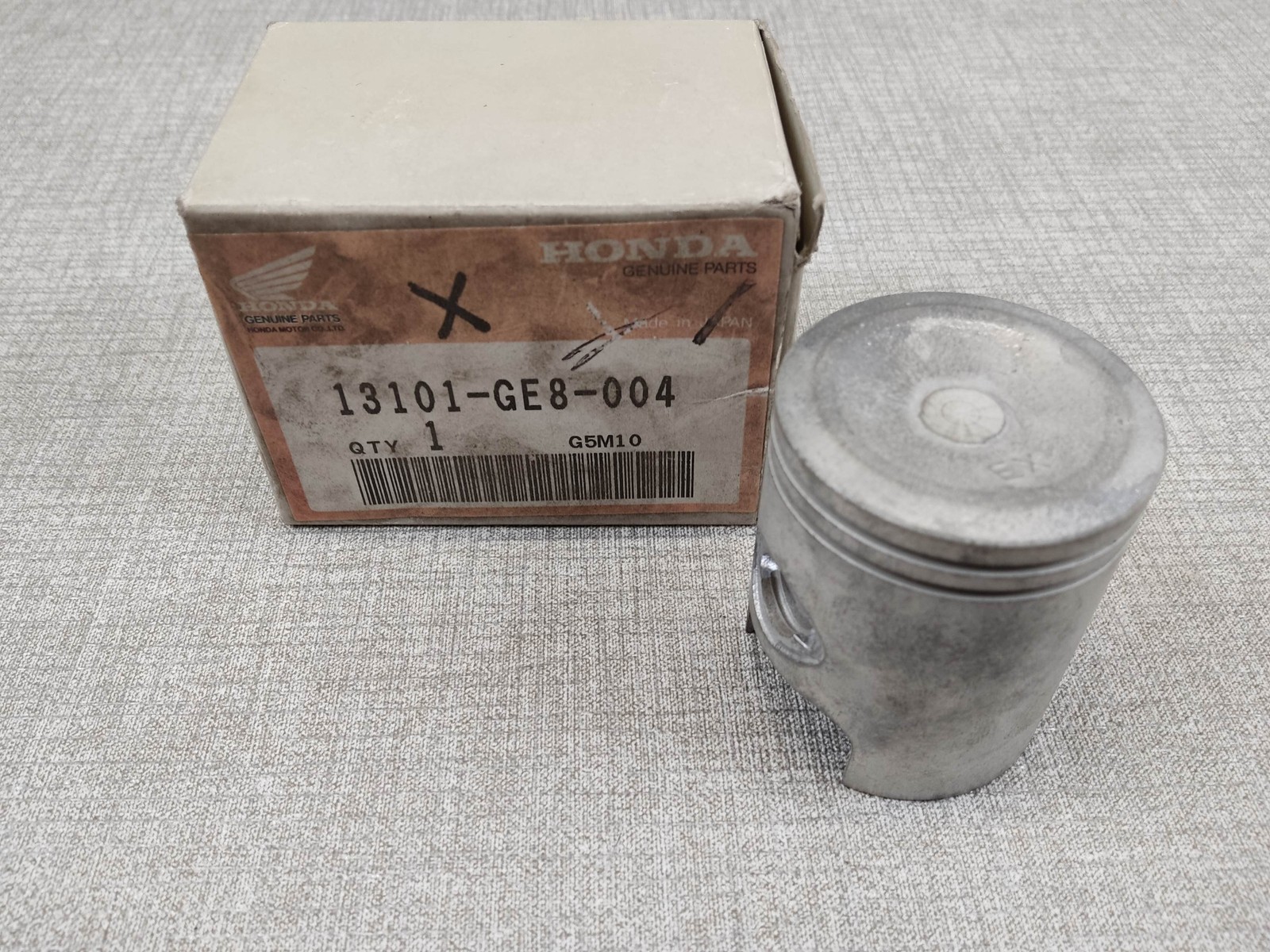 Piston STD Honda NB50M résout la perte de compression du moteur 13101-GE8-004