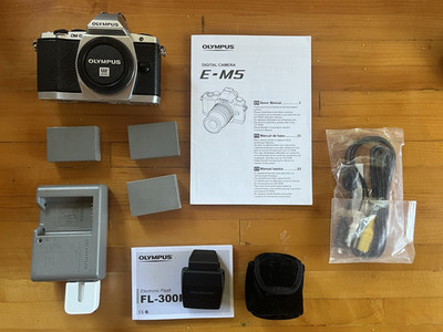 Olympus OM-D E-M5 16.1MP [ Silver ] Digital SLR  - Body + Flash + Charger