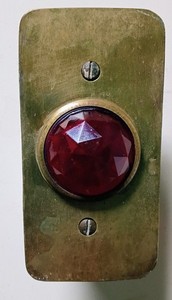 A 110-Volt Faceted 1-1/2" Red Glass Jewel Indicator Light and Extra Jewel. Look: