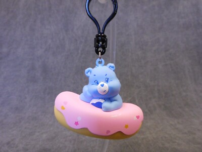 Graphics And More Cornice Portatarga Care Bears – Grumpy Bear – Trasparente, Resistente UV, Licenza Ufficiale