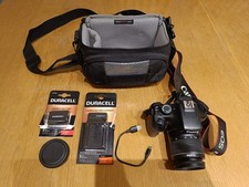 Canon EOS 1100D DSLR Camera + EF-S 18–55mm Autofocus Lens + Charger + Carry Case