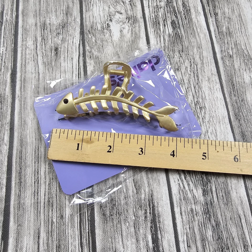 ¡NUEVO! Accesorio de pinza de pelo grande de hueso de pez dorado de metal Claires Foto 2 de 4