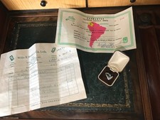 Colombian guaranteed 0.37ct deep green Emerald with cut diamonds ring with paper