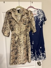 Women's Dresses. 2 For $15.Medium Size