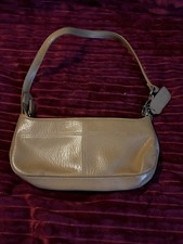 Coach Beige Pebbled Shoulder Bag Logo Tag Accent Silver Hardware Inner Pockets