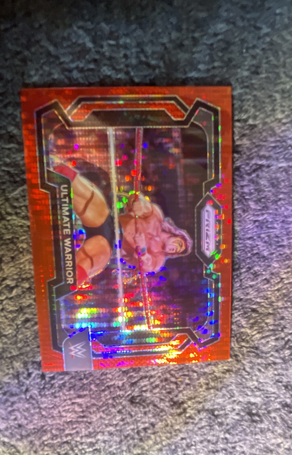 2024 Panini Prizm WWE - Ultimate Warrior #11 Red under Card Prizm /99