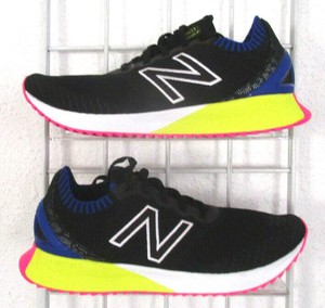 black and neon new balance