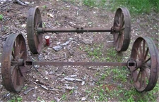 TWO USA ANTIQUE COUNTRY YARD STEAMPUNK CAST IRON GARDEN FARM TRACTOR AXEL WHEEL