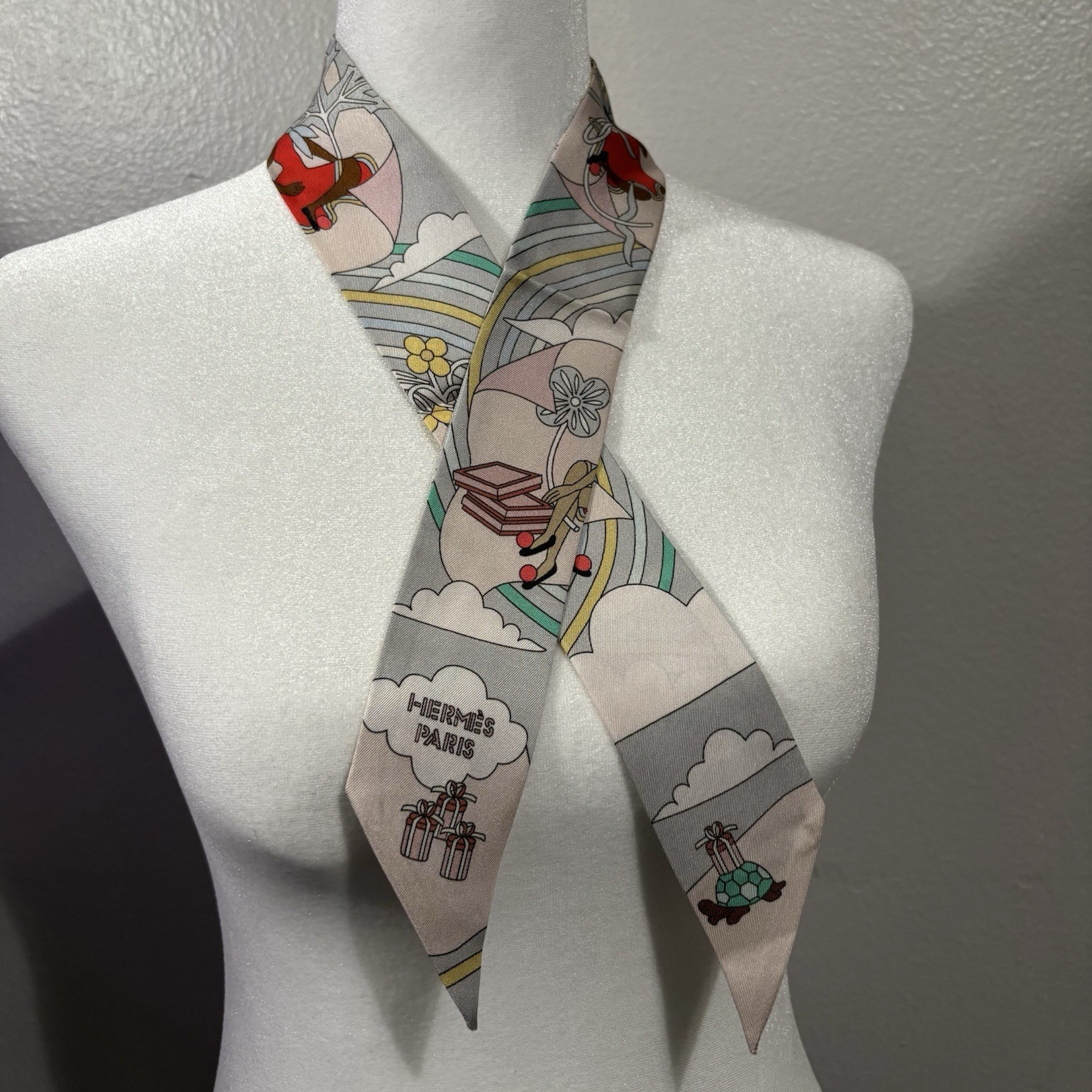 Hermès Carrés Volants Silk Twilly Scarf Gray Pink Figures Rainbow Bag Hair