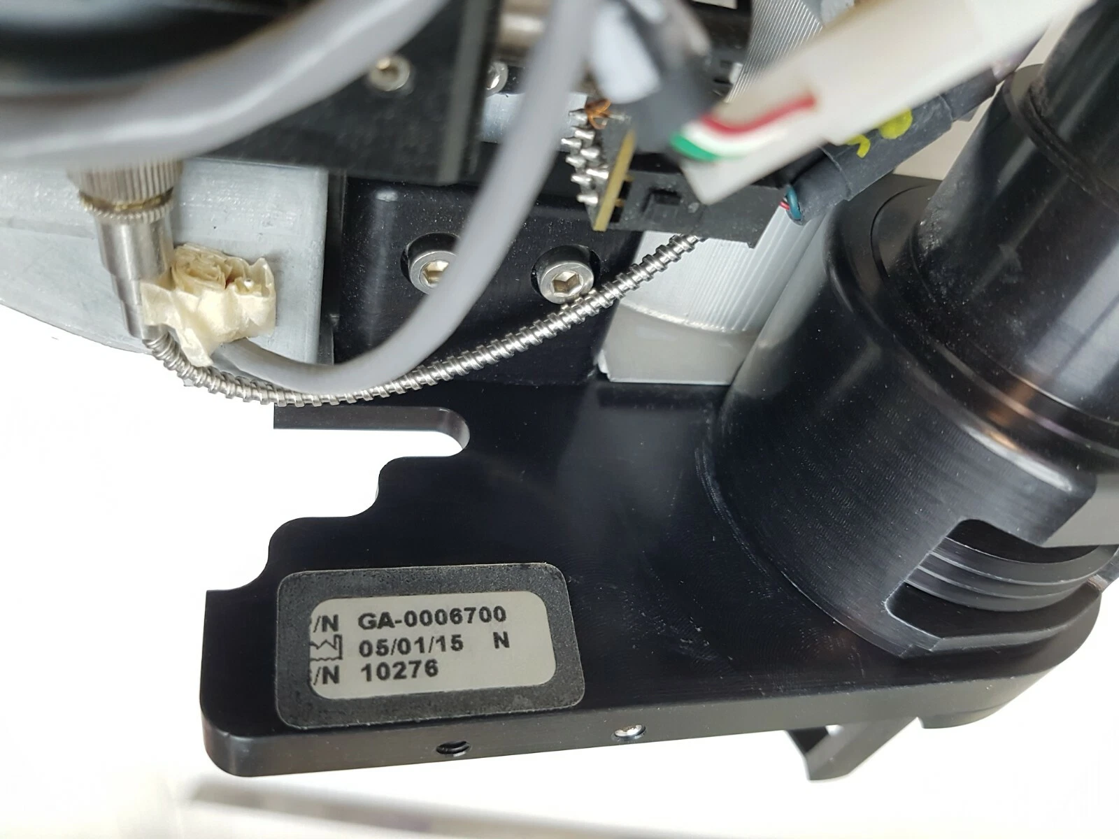 Part label on the module bracket: P/N GA-0006700, 05/01/15, S/N 10276
