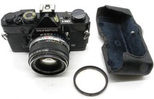 Olympus OM-1 MD Black 35mm SLR e obiettivo Olympus 50mm f/1.8 buone condizioni funzionante